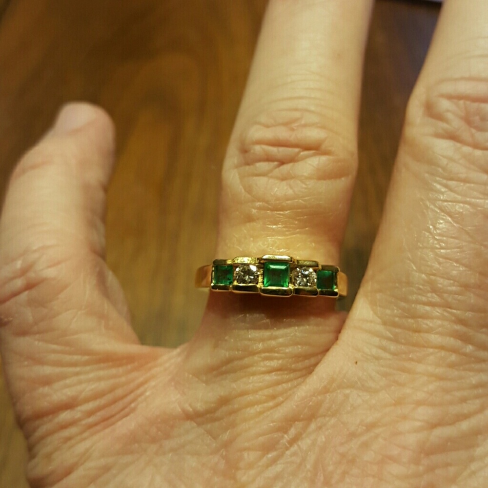 Diamond and emerald anniversary band